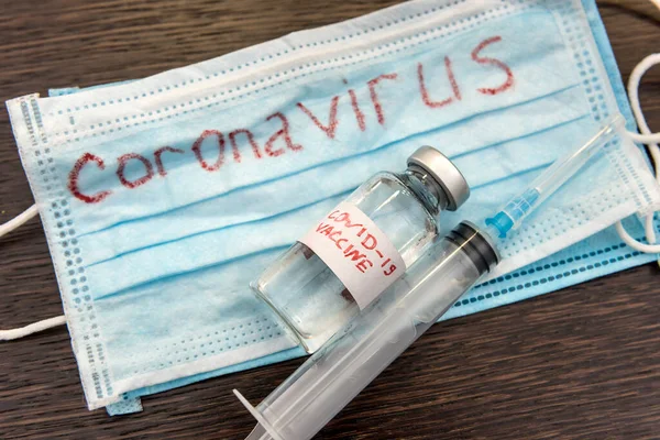 Coronavirus Epidemic Concept Medical Face Mask Red Inscription Covid Syringe — Stock Photo, Image