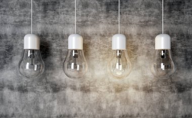 Lamba Işık Ampüller beton zemin üzerine. Lamba yanar. Işık