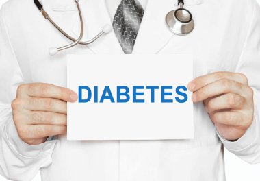 Diyabet, tıbbi kavramı ile bir kart tutan doktor
