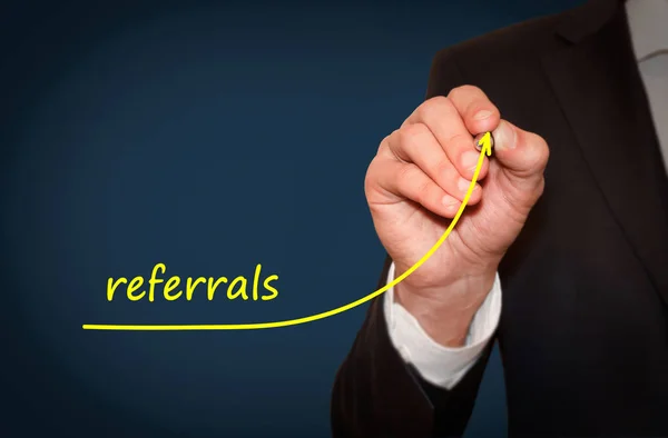 Businessman draw growing line symbolize growing referrals — Stock Photo, Image