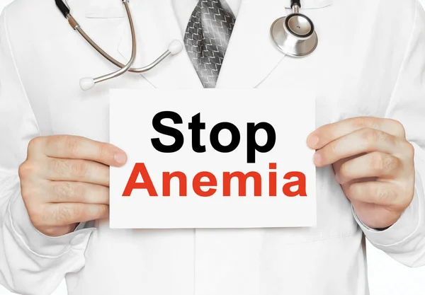 Opriți cardul de anemie în mâinile medicului — Fotografie, imagine de stoc