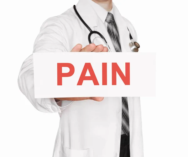 Doctor holding a card with Pain , Medical concept — Stock Photo, Image