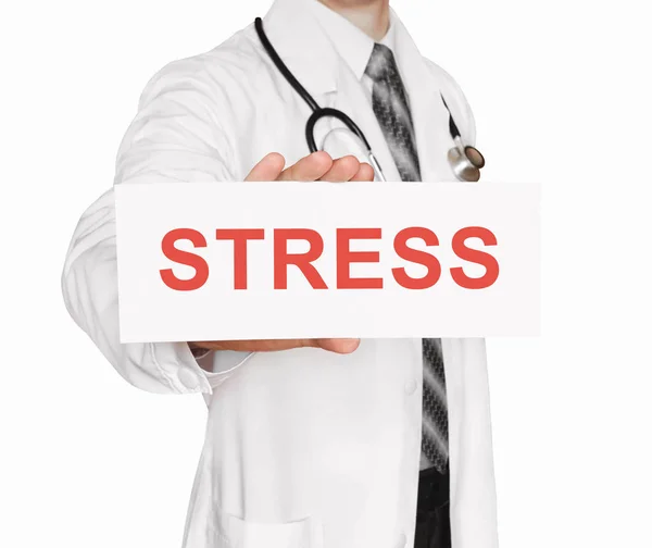 Läkare som innehar ett kort med Stress, medicinska begrepp — Stockfoto