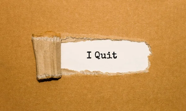 Yırtık kahverengi kağıdın arkasında görünmeyi bıraktığım metin.