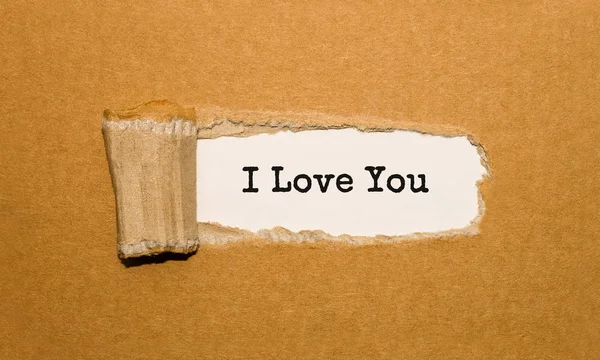 Text Love You Appearing Torn Brown Paper — Stock Photo, Image