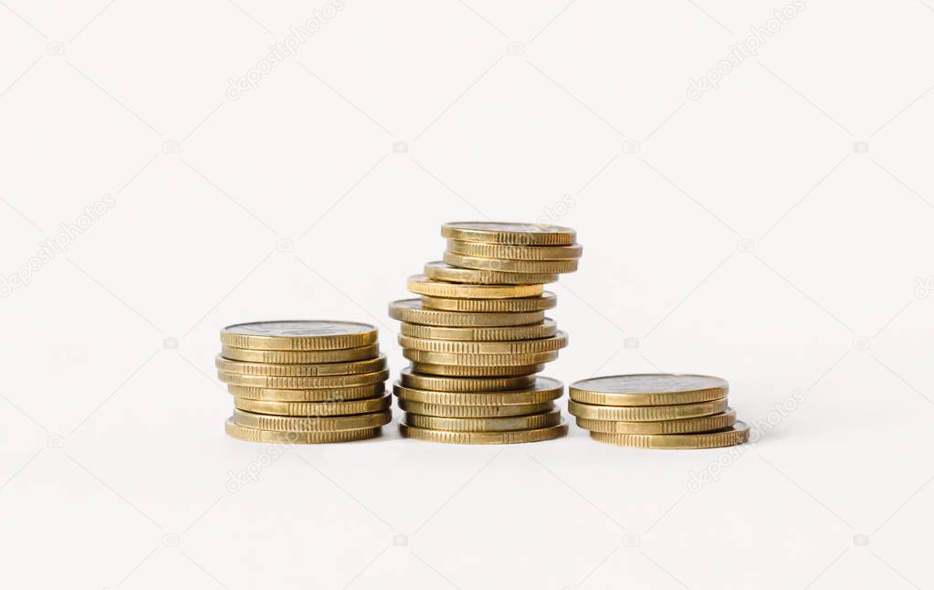 Rows of coins isolated on white background. Finance and banking concept.
