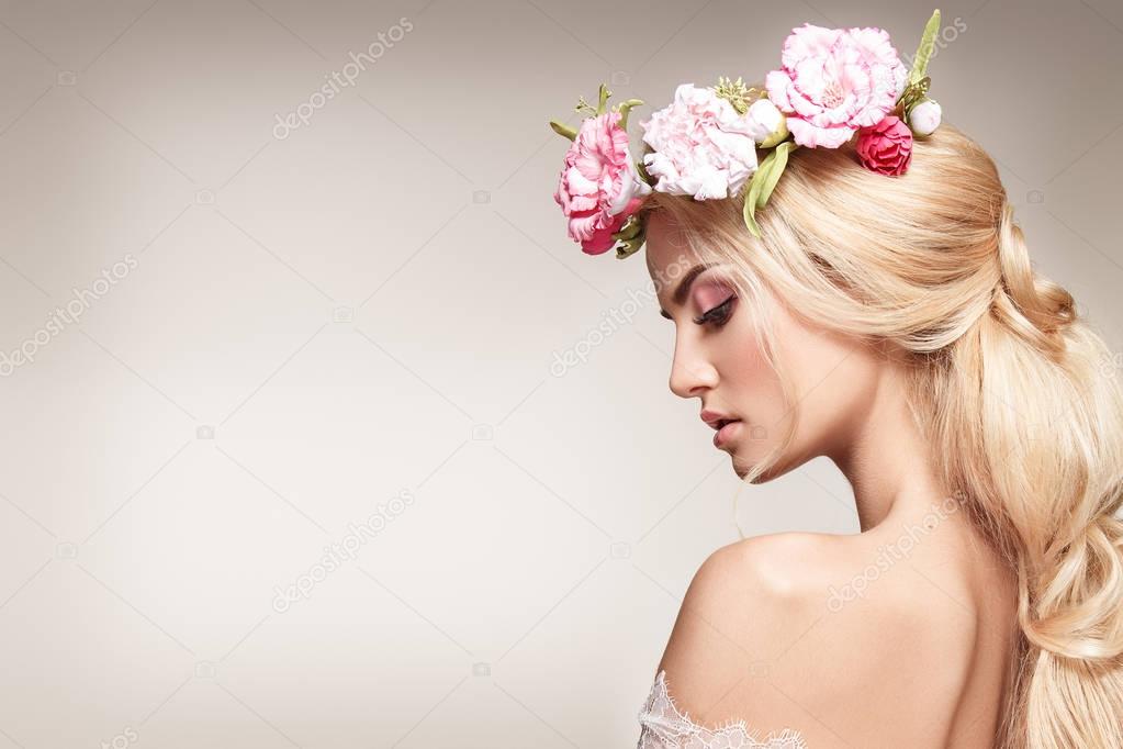 Woman with flowers on head 