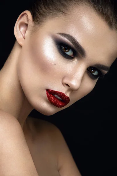 Woman with red shiny lips