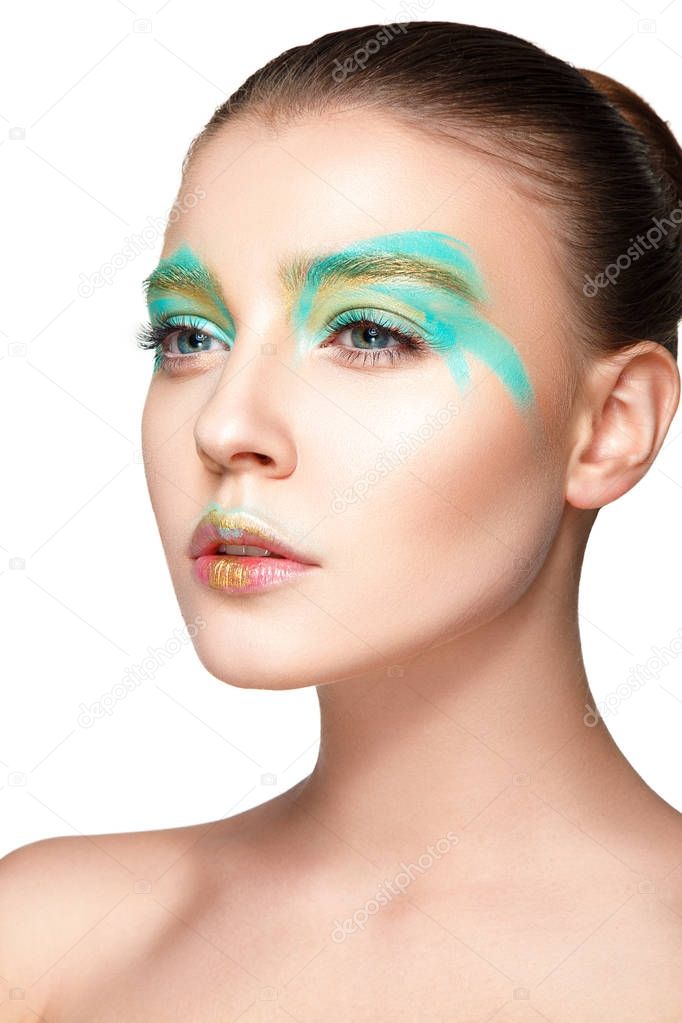 woman with green painting on face