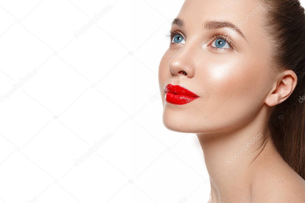 Portrait of young woman with red lips isolated on white background