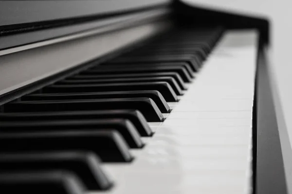 Piano keys side view — Stock Photo, Image