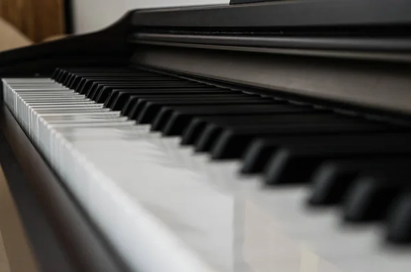 Piano keys side view — Stock Photo, Image