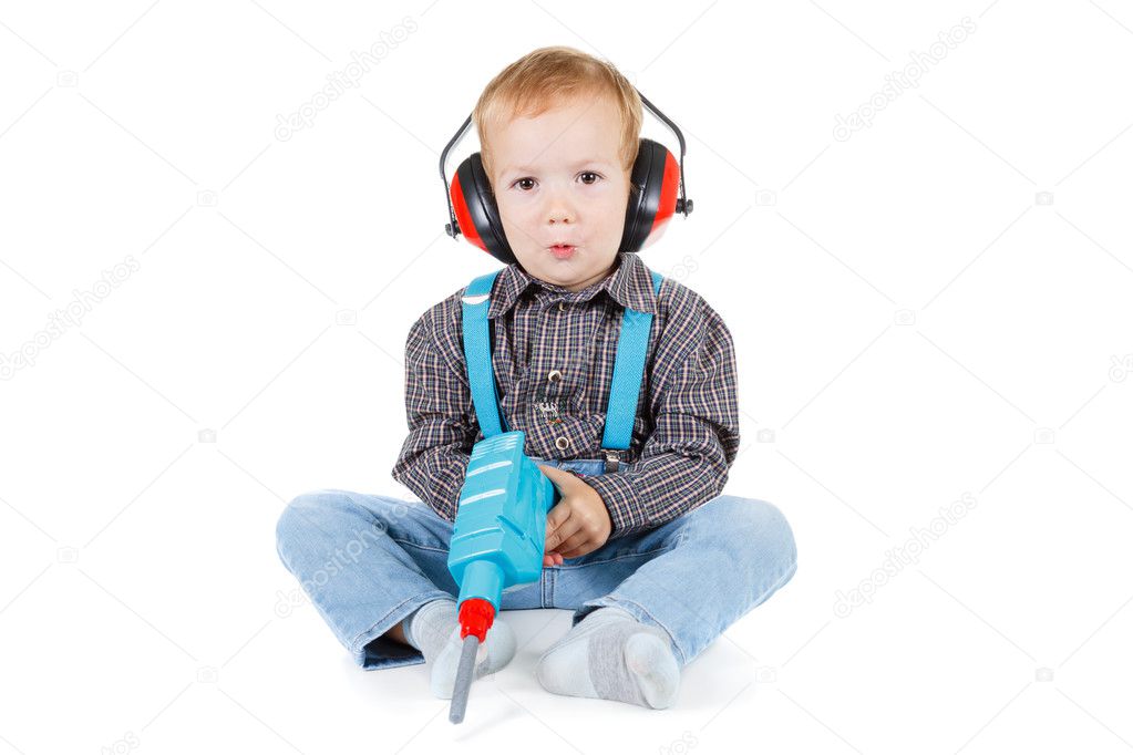 Happy little boy with tools on white background