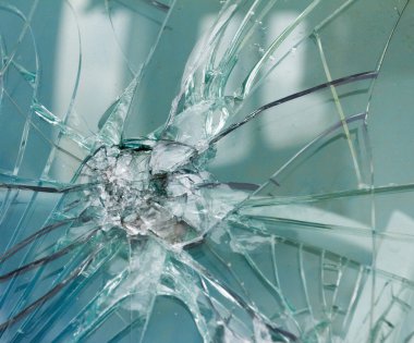 Ateşli silahlar bullethole mermi camı üzerinde çatlaklar arka plan