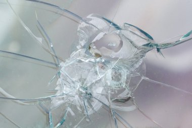 Ateşli silahlar bullethole mermi camı üzerinde çatlaklar arka plan