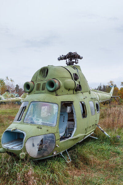 Old broken green russian helicopter