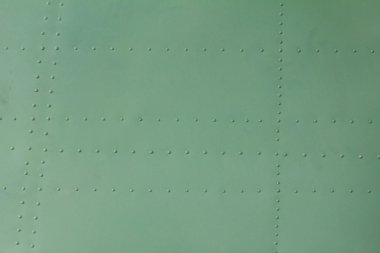 Eski boyalı metal arka plan detay bir askeri uçak, yüzey korozyon.