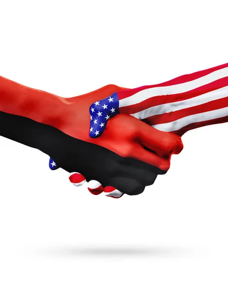 Flaggor av Förenta staterna och Angola länder, Övertryckt handslag. — Stockfoto