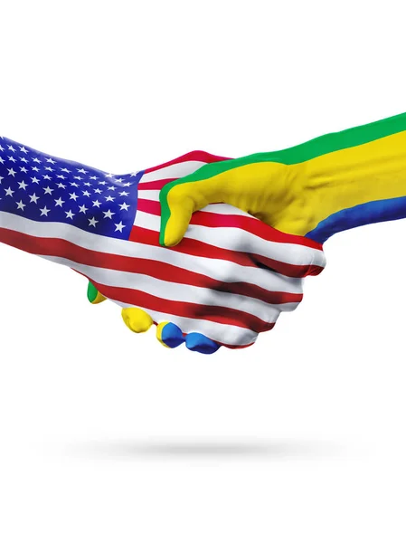 Flaggen vereinigte Staaten und Gabunenländer, partnerschaftlicher Händedruck. — Stockfoto