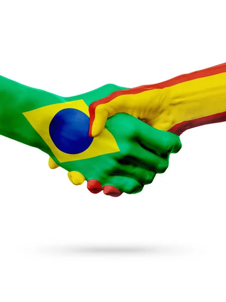 Flaggen Brasilien, Spanien, Partnerschaft Freundschaft Handschlag Konzept. — Stockfoto
