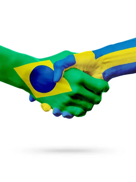 Flaggor Brasilien, Sverige länder, partnerskap vänskap handslag koncept. — Stockfoto