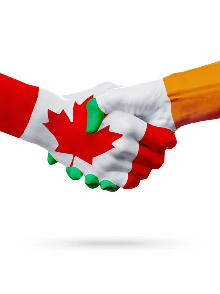 Příznaky Kanada, Irsko zemí, koncept partnerství handshake přátelství. — Stock fotografie