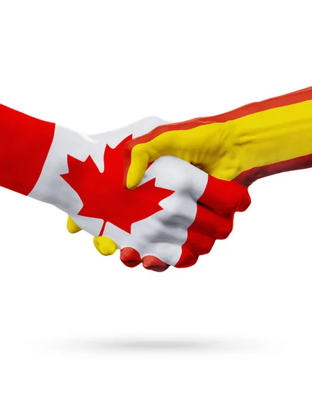 Příznaky Kanada, Španělsko zemí, koncept partnerství handshake přátelství. — Stock fotografie