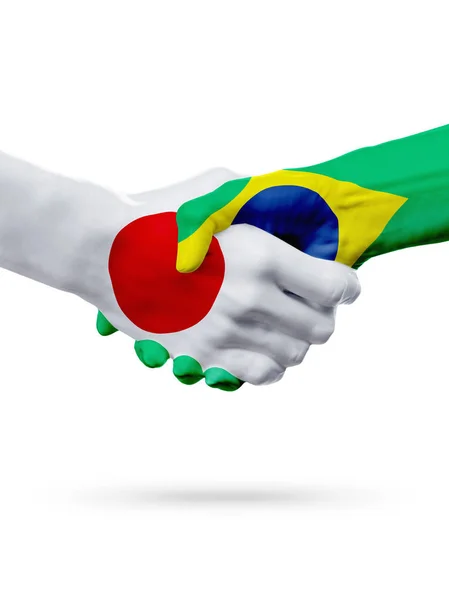 Vlaggen van Japan, Brazilië landen, partnerschap vriendschap handdruk concept. — Stockfoto