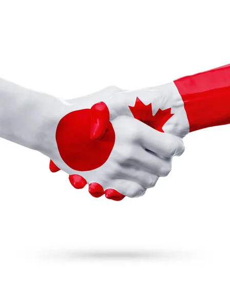 Příznaky Japonsko, Kanada zemí, koncept partnerství handshake přátelství. — Stock fotografie