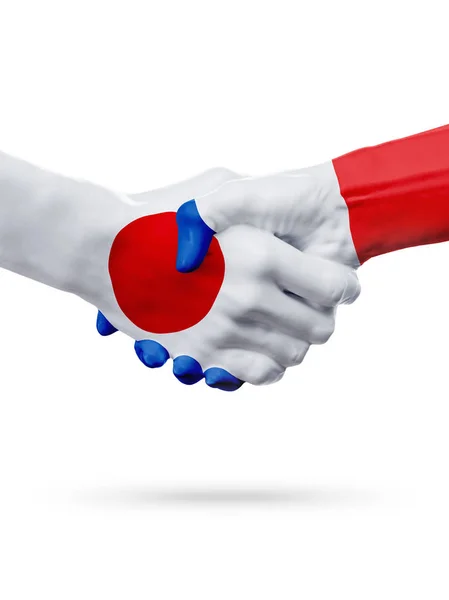 Прапори Японії, Франції країн, Концепція партнерства дружби рукостискання. — стокове фото