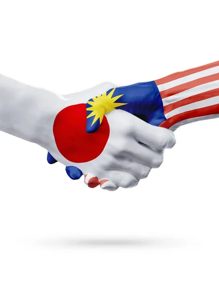 Banderas Japón, Malasia países, asociación amistad apretón de manos concepto . — Foto de Stock