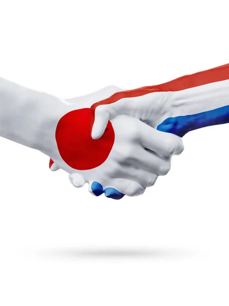 일본, 네덜란드 국가, 파트너십 우정 핸드셰이크 개념 플래그. — 스톡 사진
