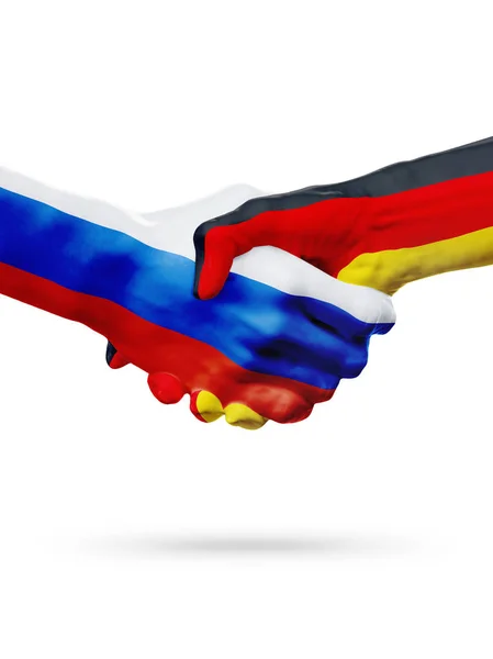 Zászlók, Oroszország, Németország-országok, a partnerségi baráti kézfogás koncepciója. — Stock Fotó