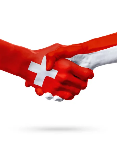 Flaggor Schweiz, Monaco länder, partnerskap vänskap handslag koncept. — Stockfoto