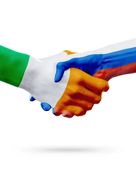 Flaggen Irland, Russland Länder, Partnerschaft Freundschaft Handshake-Konzept. — Stockfoto