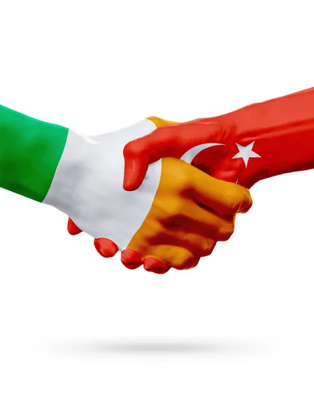 Vlaggen Ierland, Turkije landen, partnerschap vriendschap handdruk concept. — Stockfoto