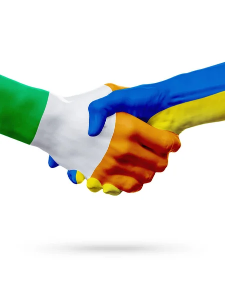 Flags Ireland, Ukraine countries, partnership friendship handshake concept. — Stock Photo, Image