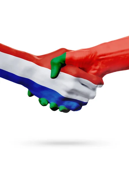 Флаги Нидерланды, Португалия, партнерская концепция рукопожатия . — стоковое фото