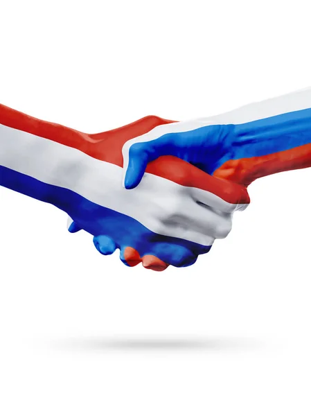 Bandeiras de Países Baixos, países de Rússia, conceito de parceria amizade aperto de mão. — Fotografia de Stock