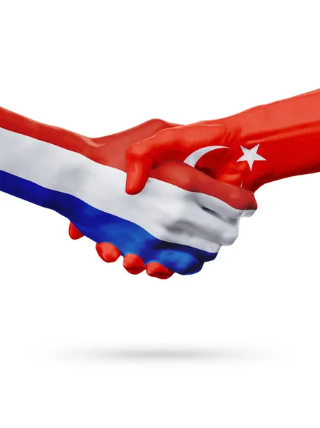 Bandeiras de Países Baixos, Turquia países, o conceito de parceria amizade aperto de mão. — Fotografia de Stock