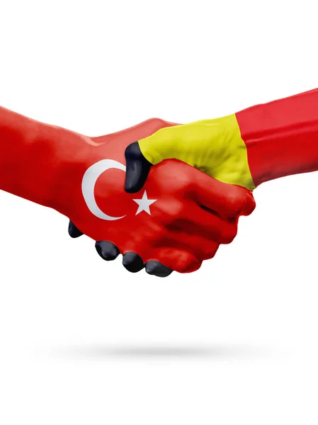 Vlaggen van de Republiek Turkije, de landen België, partnerschap vriendschap handdruk concept. — Stockfoto