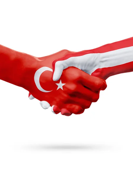 Vlaggen van de Republiek Turkije, de landen Oostenrijk, partnerschap vriendschap handdruk concept. — Stockfoto