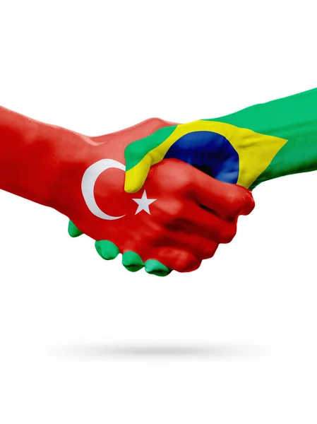Vlaggen van de Republiek Turkije, de landen Brazilië, partnerschap vriendschap handdruk concept. — Stockfoto