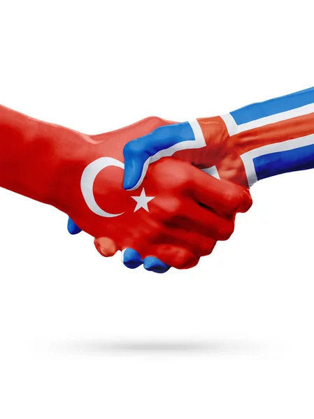 Zászlók a Török Köztársaság, Izland országok, a partnerségi baráti kézfogás koncepciója. — Stock Fotó