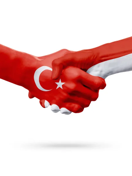 Zászlók a Török Köztársaság, Monaco országok, a partnerségi baráti kézfogás koncepciója. — Stock Fotó