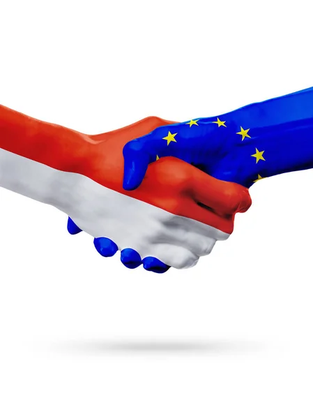Vlaggen Monaco, landen van de Europese Unie, partnerschap vriendschap handdruk concept. — Stockfoto