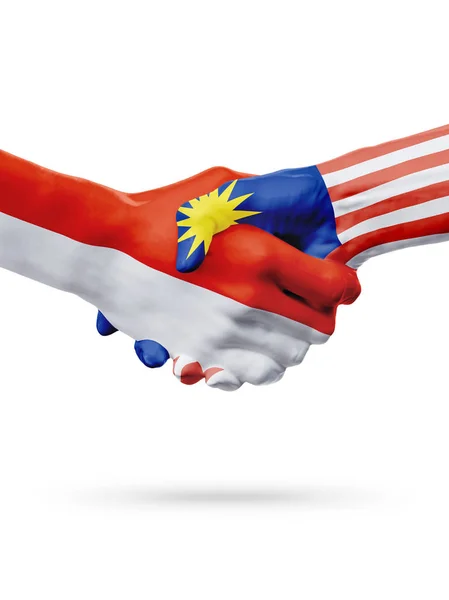 Флаги Монако, Малайзия, партнерская концепция рукопожатия . — стоковое фото