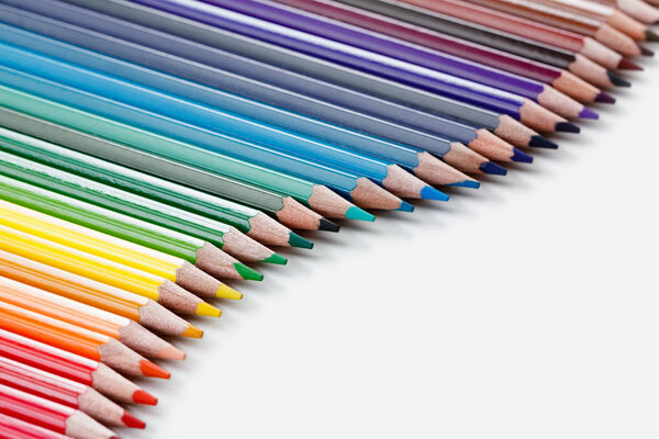 Group of colored pencils on white