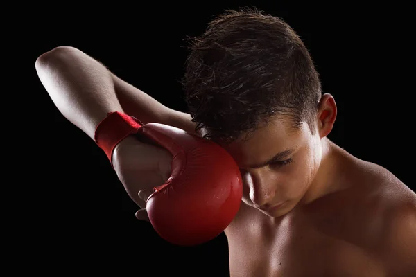 Young man wearing gloves, sports, karate or boxing, martial arts