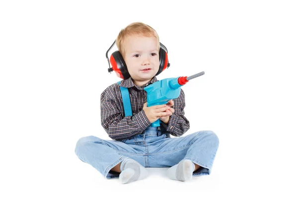 Little boy plays in the builder with tools. isolated over white. — Stock Photo, Image